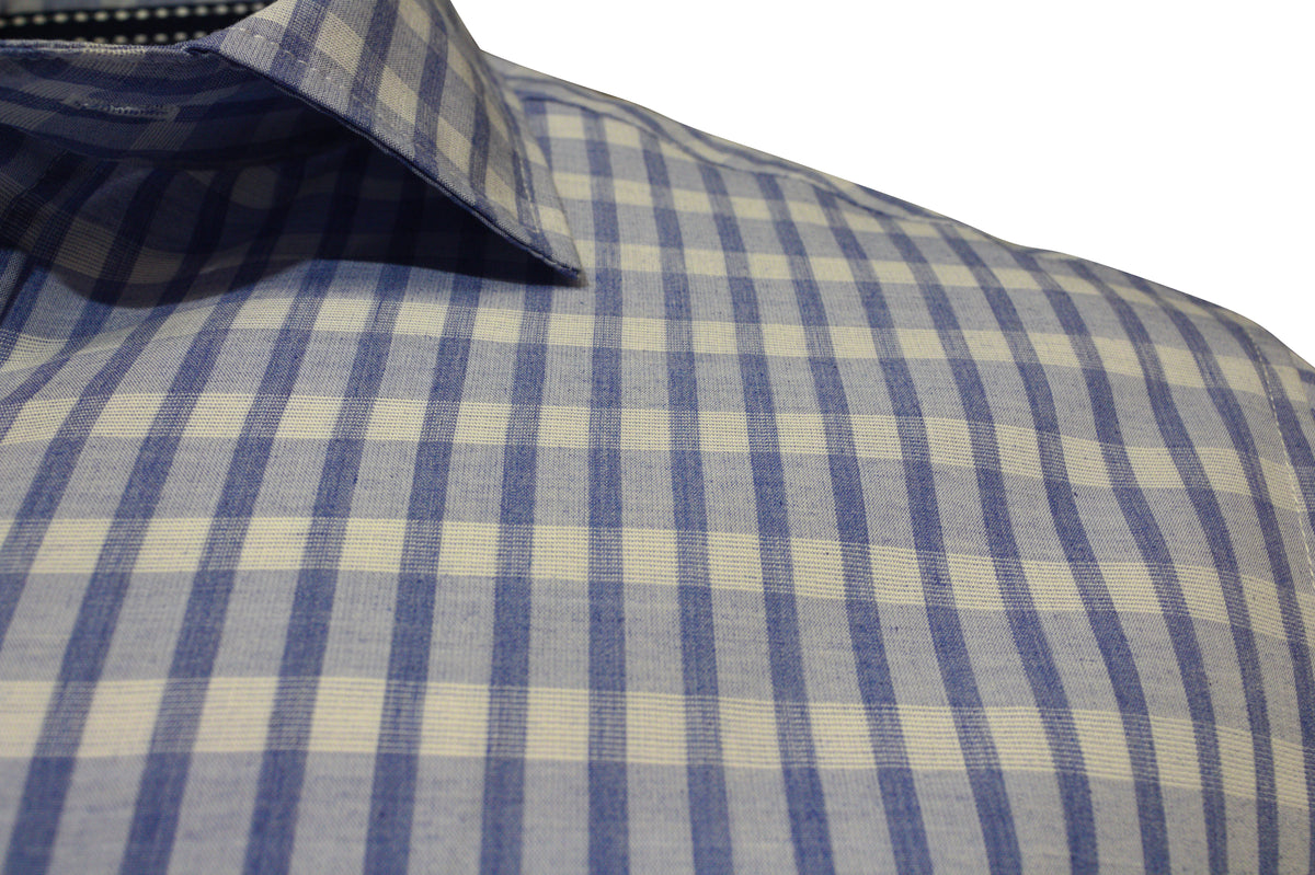 The Back Bay Bamboo Linen Soft Touch Short Sleeve Shirt features a blue and white checkered design with a square grid pattern. Its collar showcases the textured Bamboo/Linen blend, perfect for a casual look.
