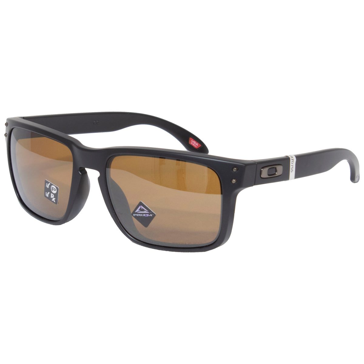 Explore the Oakley Holbrook sunglasses, featuring a sleek square design with black frames and brown Tungsten Polarized lenses. A small logo on the left arm and a diamond-shaped sticker showcase their superior UV protection and advanced Prizm lens technology.