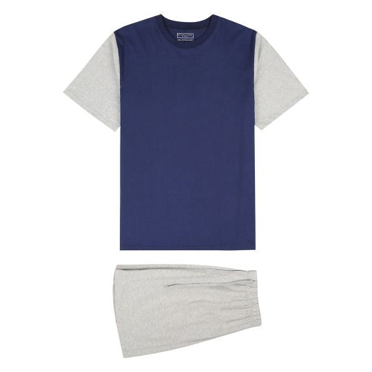 The Koala Nitelife Knit PJ Short Leg Set is a summertime pajama set made from 100% cotton. It features a blue short-sleeve shirt with light gray sleeves and matching light gray shorts. Both the shirt and shorts are displayed flat on a white background.