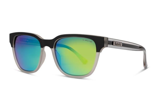 Introducing the Liive Billy Mirror Polar Sunglasses: these sleek black and gray sunglasses feature polarized, reflective gradient lenses that transition from blue to a green mirror finish. The modern, angular frame design is complemented by temple arms adorned with a small rectangular metallic accent displaying the word "Liive." Experience superior UV protection each time you wear them.