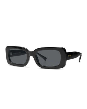 The Liive Crush Sunglasses are a pair of sleek black rectangular shades with UV protection and dark lenses. The frame showcases a subtle gold "Liive" logo on the temples, offering a modern and stylish look. These chic sunglasses are the perfect accessory for sun protection.