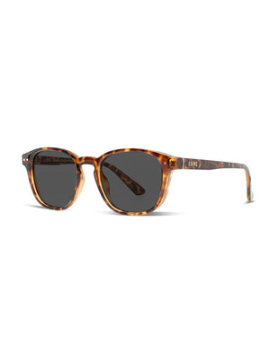 Liive Phoenix Polar Sunglasses feature tortoiseshell frames with grey polarized, slightly rounded rectangular lenses, offering superb UV protection. Gold text branding accents near the hinges provide a modern, stylish look that blends classic and contemporary elements for the ultimate experience.