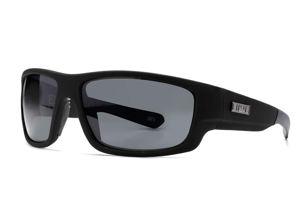 A pair of black, rectangular-frame Liive Exile Sunglasses with dark tinted, polarized lenses. The arms are straight and feature a small, metallic detail near the hinge on the left arm. The lenses provide UV protection and are labeled "CAT 3." These stylish sunglasses are positioned at an angle against a white background.