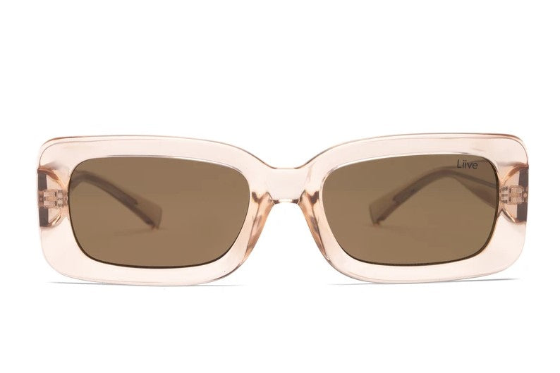 Liive Crush Sunglasses feature a front view of rectangular translucent beige frames with smoke lenses, providing excellent UV protection.
