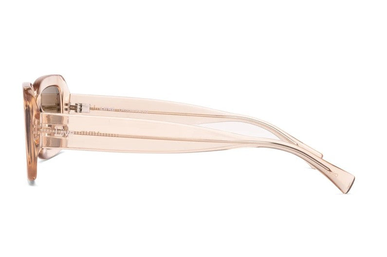 Side view of Liive Crush Sunglasses with transparent pinkish-beige polycarbonate frames, UV protection, sleek curved temples, visible hinges, and smoke lenses, seamlessly combining style and functionality.