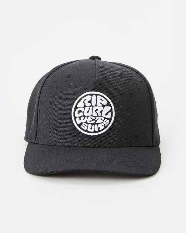 The Rip Curl Wetty Snap Back Cap is a black baseball cap with a round white embroidered patch featuring the text "RIP CURL WETSUITS" on the front. It offers an adjustable strap for customized fitting and is set against a light gray background.