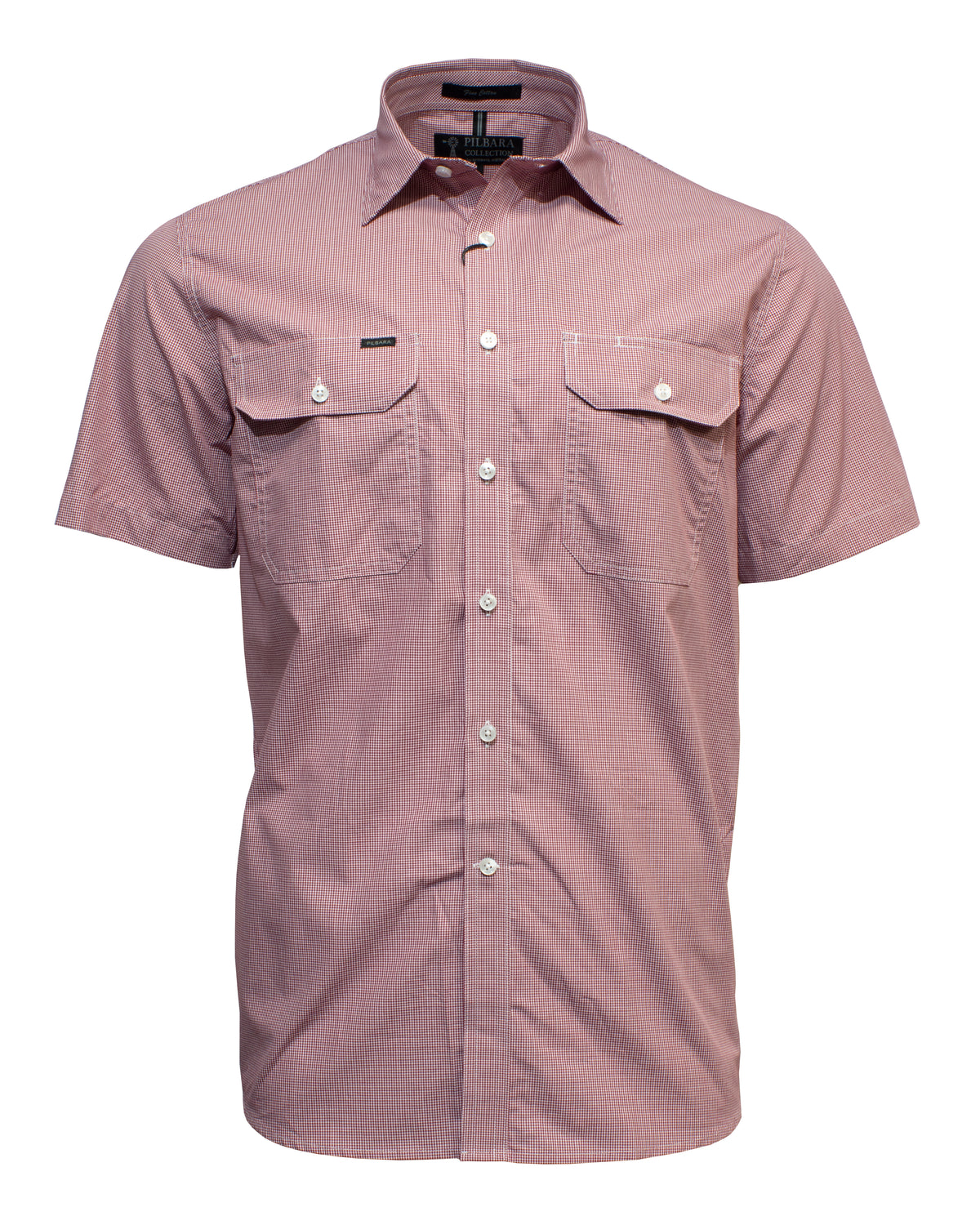 The Ritemate Pilbara Short Sleeve Check Double Pocket Shirt is displayed in a light red or pinkish hue. Made of 100% cotton, this casual shirt features two chest pockets with buttoned flaps and a pointed collar. The fabric appears lightweight and slightly textured for ultimate comfort.