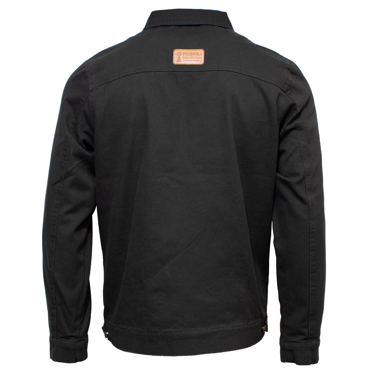A back view of the Ritemate Pilbara Jacket reveals a black denim design with long sleeves and a collar. This stylish jacket features a leather patch displaying the brand logo and "Pikeur" text at the top center of the back, along with button cuffs and adjustable waist tabs on either side.