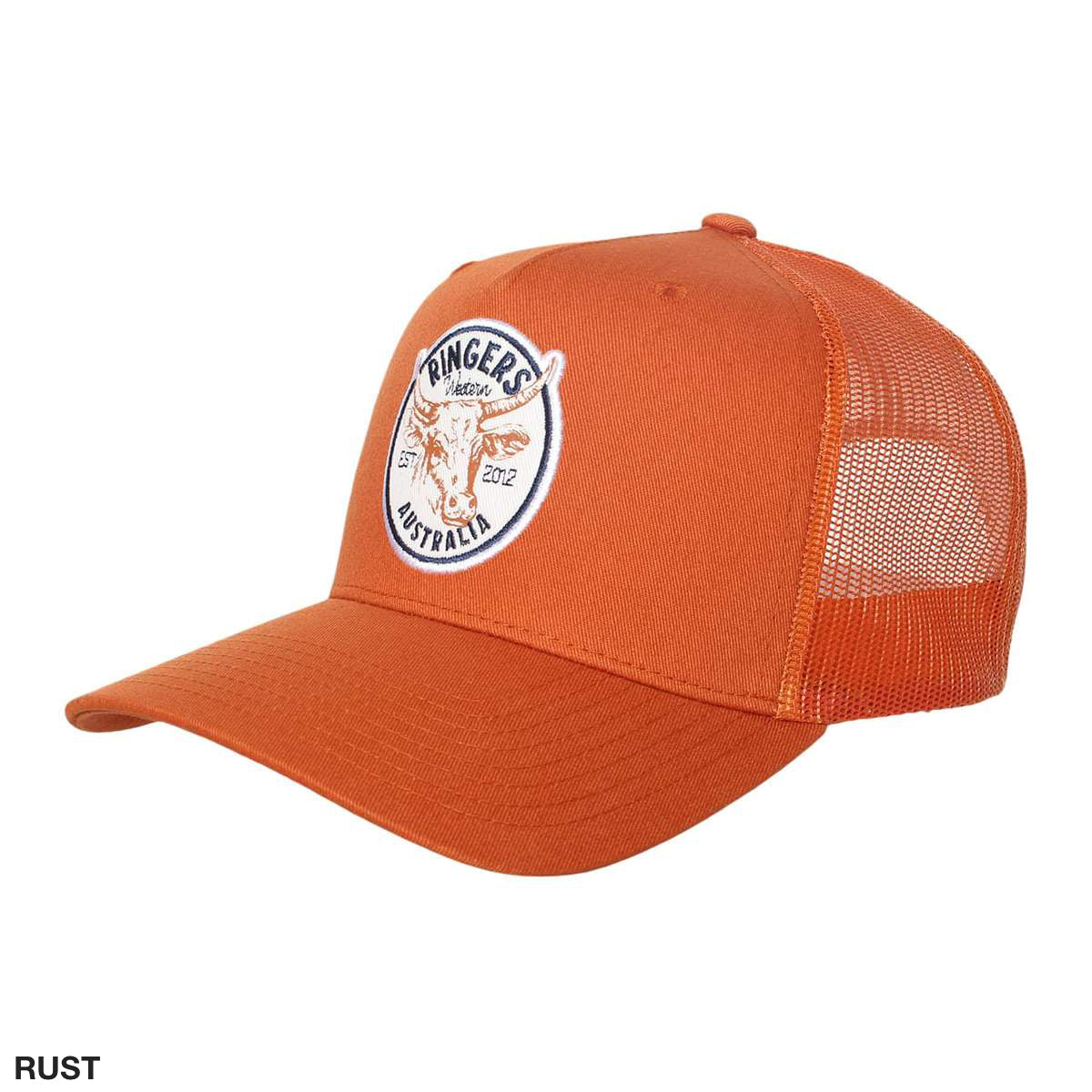The Ringers Western Scrubba Trucker Cap in rust boasts an orange design with a breathable mesh back, a circular patch showcasing a bull skull, and the text "Ringers Western Australia 2012." It also includes an adjustable strap for a comfortable fit.