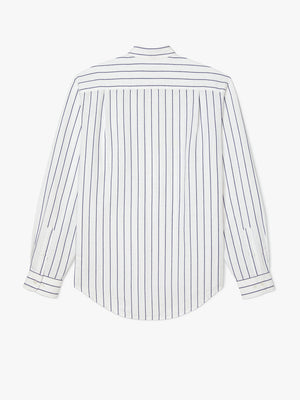 The RM Williams Collins Shirt is a white shirt with vertical navy blue stripes, featuring a shoulder yoke and buttoned cuffs—combining style and comfort for any occasion.