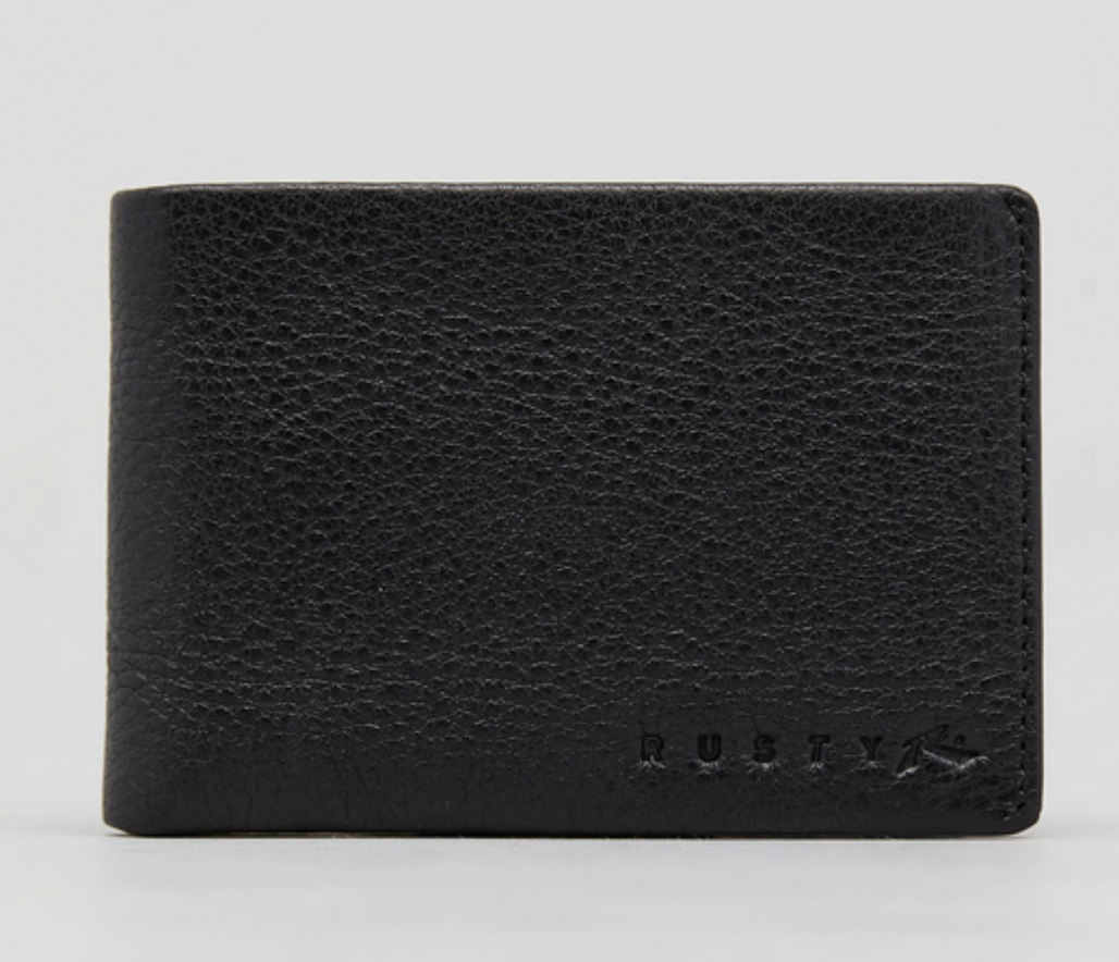The Rusty Busted Leather Wallet features black textured leather, RFID security, and "RUSTY" embossed at the lower right corner, shown against a plain light background.