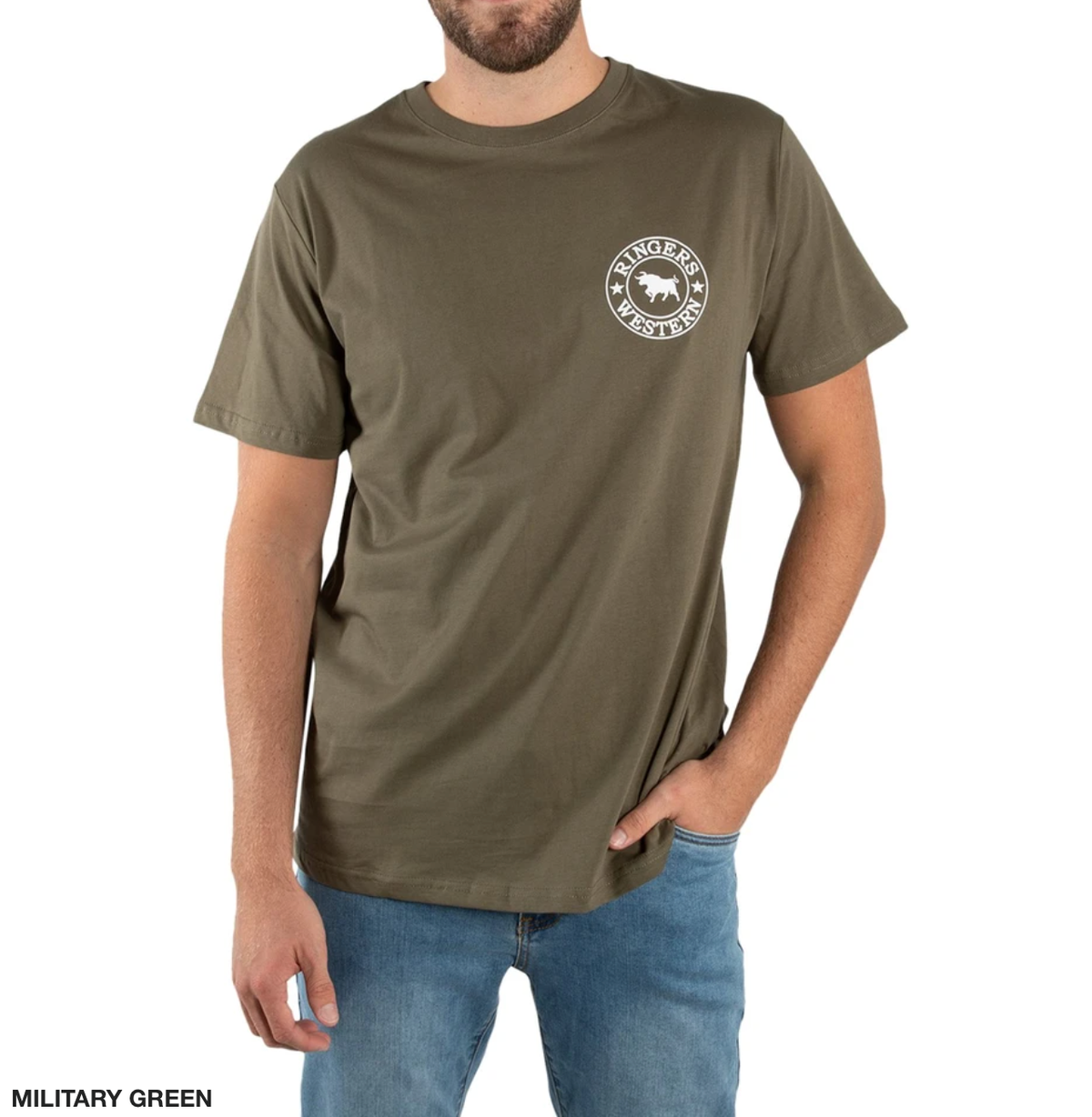 A man wears a 100% cotton Ringers Western Signature Bull Classic T-Shirt in military green, showcasing a small circular logo with a skull and crossed items on the left chest. He pairs it effortlessly with blue jeans, one hand in his pocket and the other resting casually by his side.