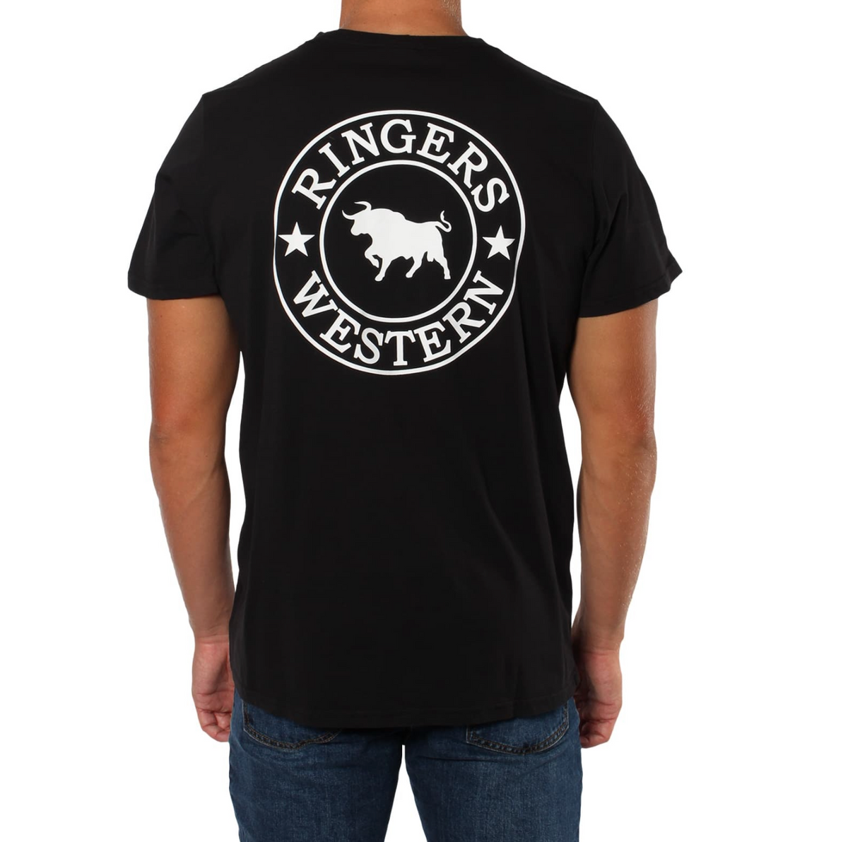 A man sports a black Ringers Western Signature Bull Classic T-Shirt, featuring the iconic logo—a white circle with a bull and stars—on the back. He pairs this 100% cotton short sleeve tee with classic blue jeans for a modern, relaxed look.