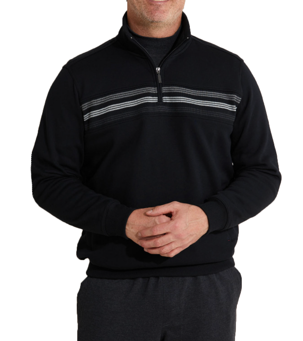 A person is wearing the Breakaway Hils Snowy Mt Fleece Half Zip, featuring a black half zip front with gray horizontal stripes across the chest and paired with dark gray pants. The comfortable fleece boasts a rib knit collar, enhancing its stylish appeal. The person stands against a white background, their hands clasped in front.