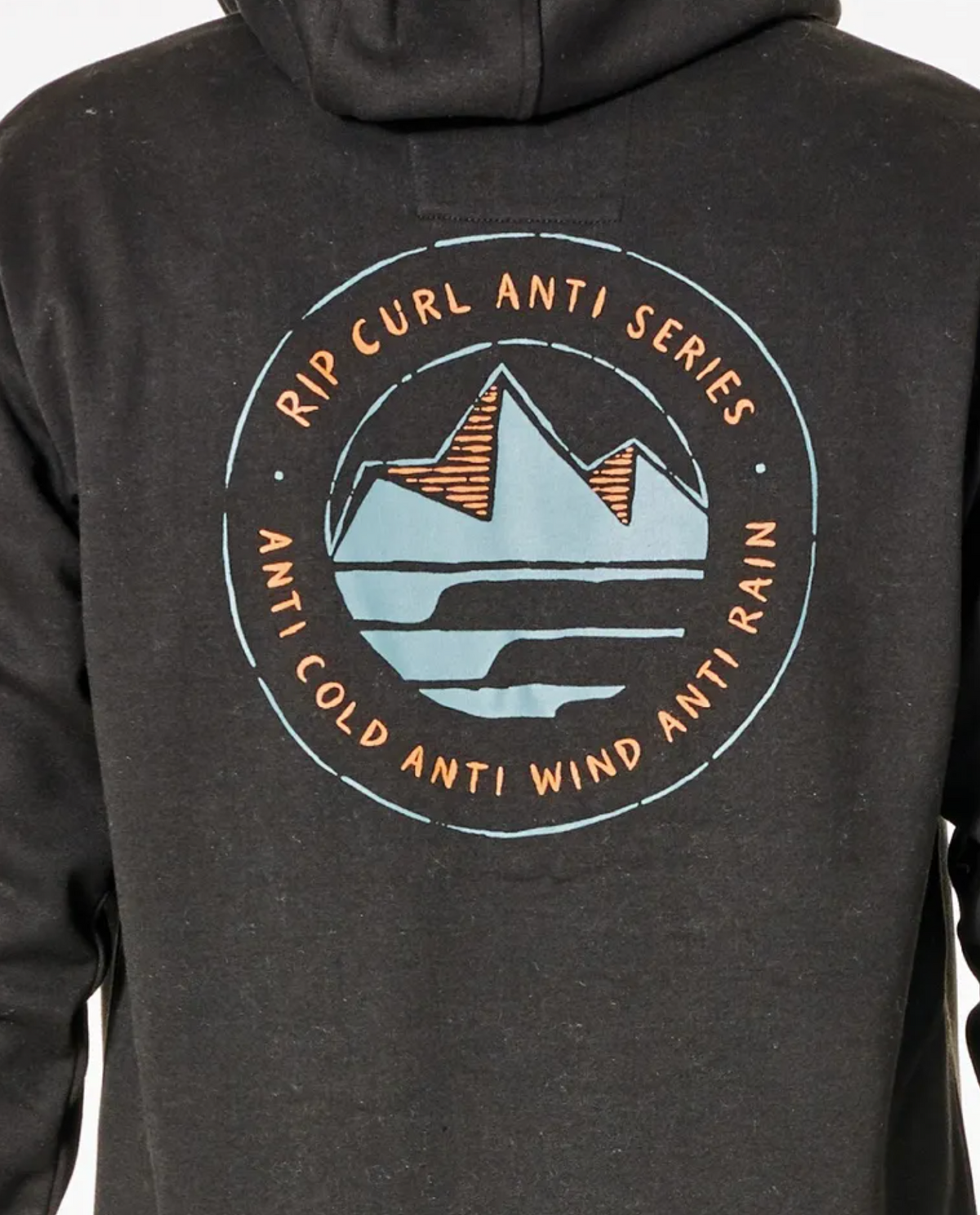 The Rip Curl Anti Series Journey Hood showcases a back view with a black hoodie and circular logo of stylized mountains and waves. The text "Rip Curl Anti Series, Anti Cold, Anti Wind, Anti Rain" highlights its winter design with durable water-resistant fabric for ultimate protection.