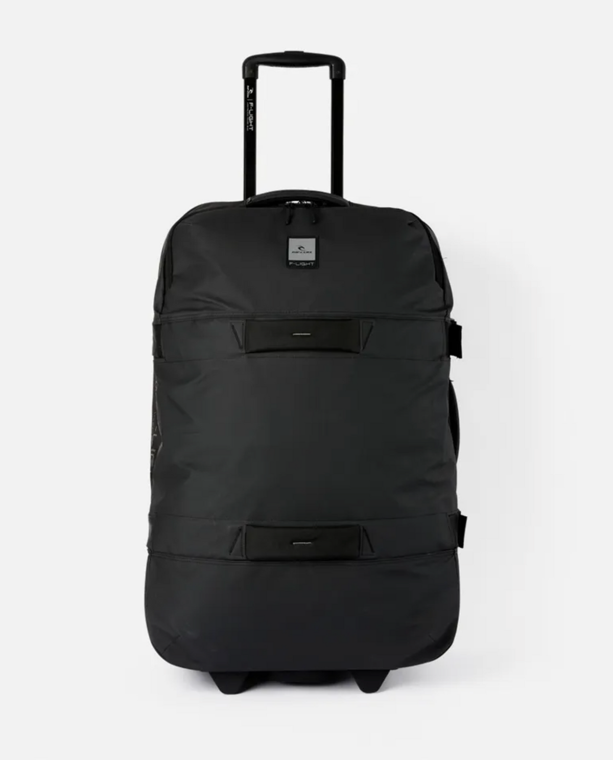 The Rip Curl F-Light Global 110L Midnight Travel Bag is a large black rolling duffel with a telescopic handle and two wheels. It has a rectangular logo patch on the front, durable fabric, a smooth surface, and two horizontal straps.