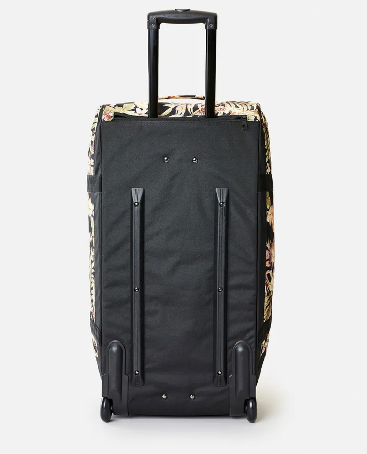 The Rip Curl Jupiter 80L Sunday Swell Travel Bag is a black suitcase with floral-patterned sides, crafted from recycled polyester. It features a retractable handle and sturdy wheels, standing upright against a plain white background.