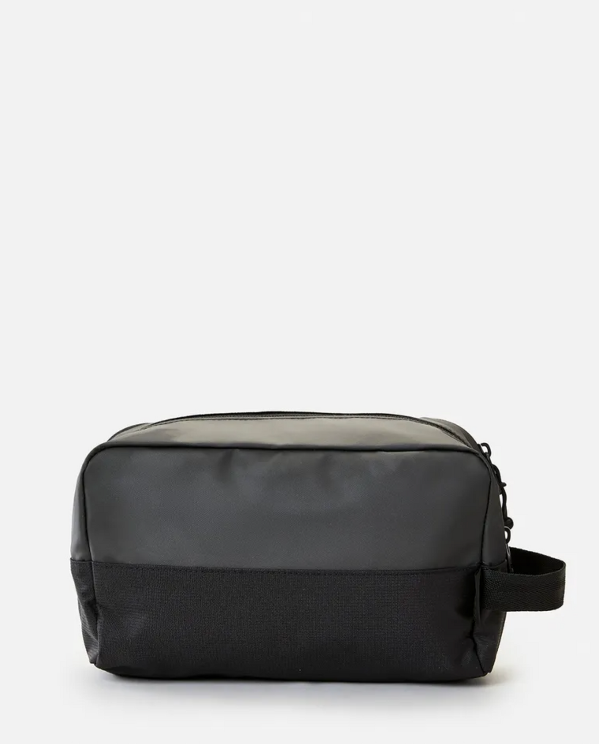 A Rip Curl Groom Toiletry Midnight bag with a rectangular shape, featuring a black design, zippered closure, and side handle. The upper part of the bag is made of smooth polyester fabric, while the base has a slightly textured finish. The background is plain white.