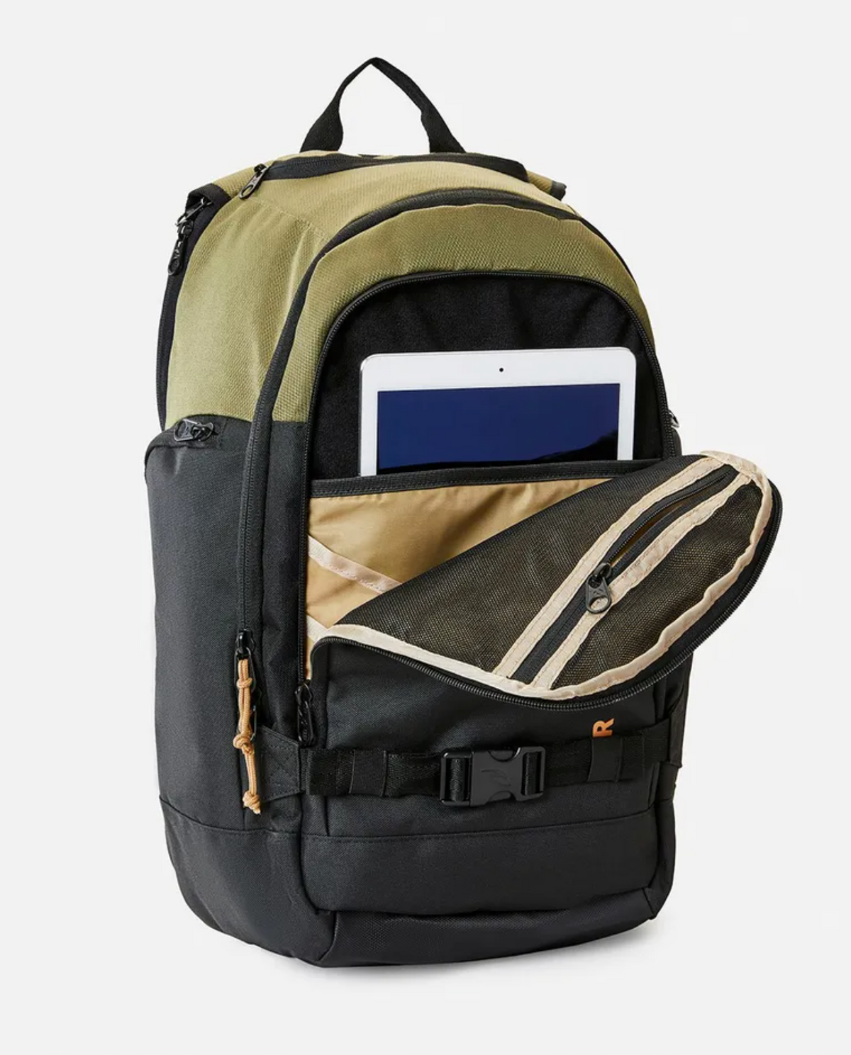 A Rip Curl Posse 33L Overland Backpack in black and green with a partially open zippered front pocket, revealing a tablet inside. Made from recycled polyester, this backpack features an additional small handle on top and various compartments, including an internal laptop section for storage.
