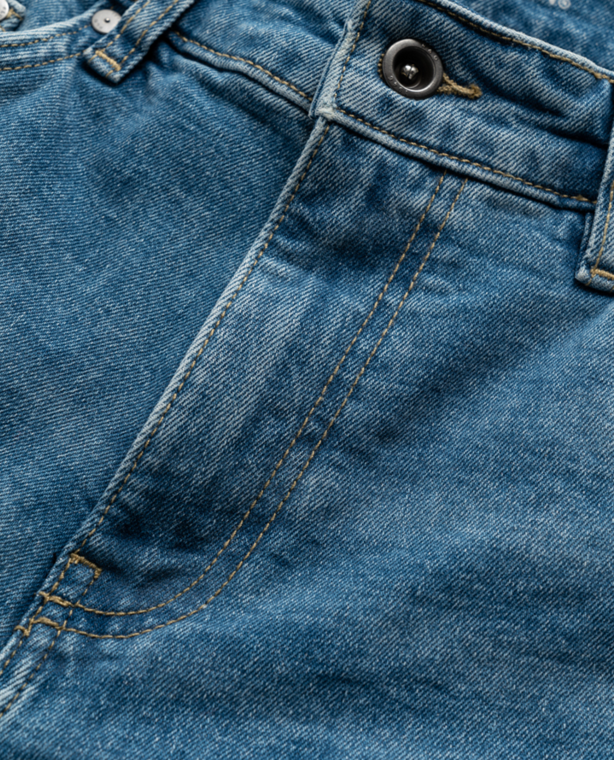 Close-up of the Rodd & Gunn Stephens Bay Summer Short showcasing the front pocket, button, and yellow stitching details.
