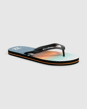 A single Billabong Stripe Thong flip-flop with a black strap is shown. The footbed features a contrast spliced design with horizontal stripes in various colors including blue, orange, and turquoise. The sole has a double layer in black and orange. The brand logo is visible on both the strap and the footbed.