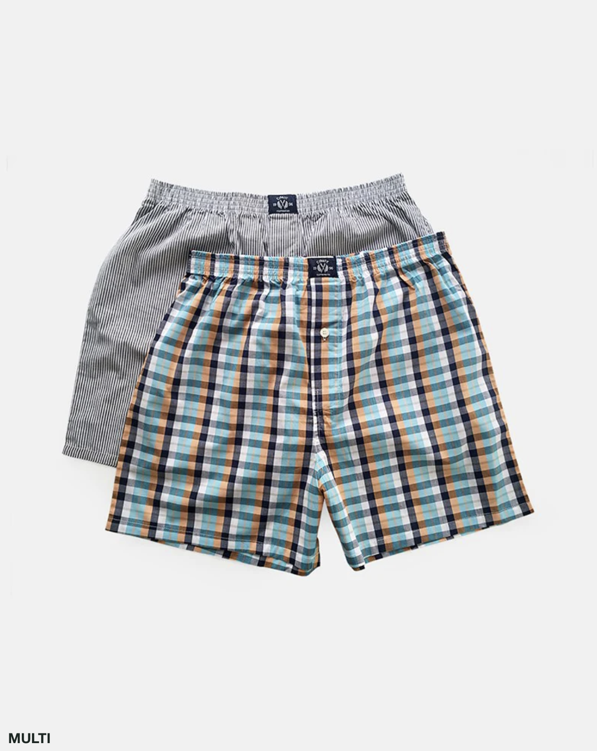 Two pairs of men's boxers from the Coast Clothing Woven Check Boxers 2 Pack are displayed against a white background. The top pair showcases a woven check pattern in shades of blue, orange, black, and white, while the bottom pair features a black and white vertical stripe design. Made from 100% cotton. Label text: "MULTI".