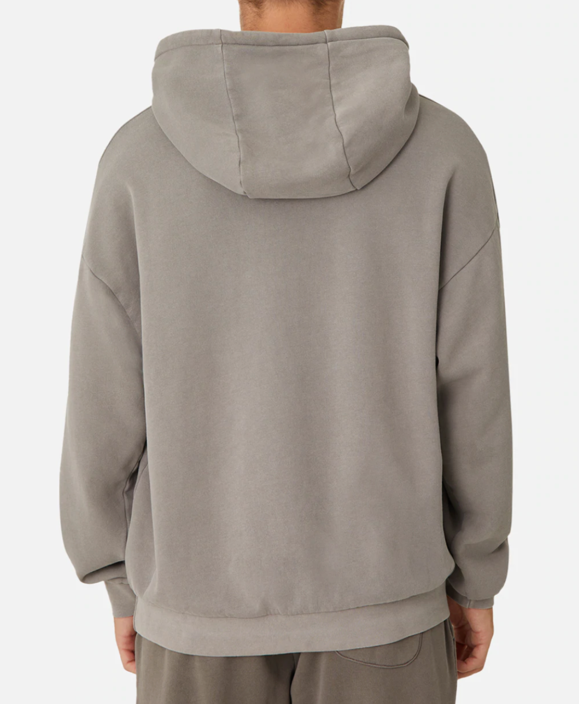 A rear view of a person wearing the oversized, comfy Industrie The Del Sur Hoodie in gray with matching pants, featuring a large hood, long sleeves, and an embroidered Industrie logo against a white backdrop.