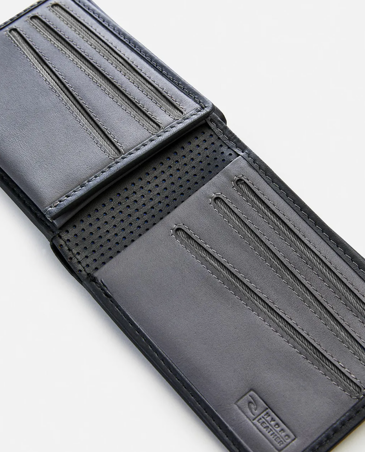 A close-up of an open Rip Curl Hydro RFID All Day Wallet in black Hydro leather, showcasing multiple diagonal card slots, a perforated center section, detailed stitching, RFID protection, and a small embossed logo.