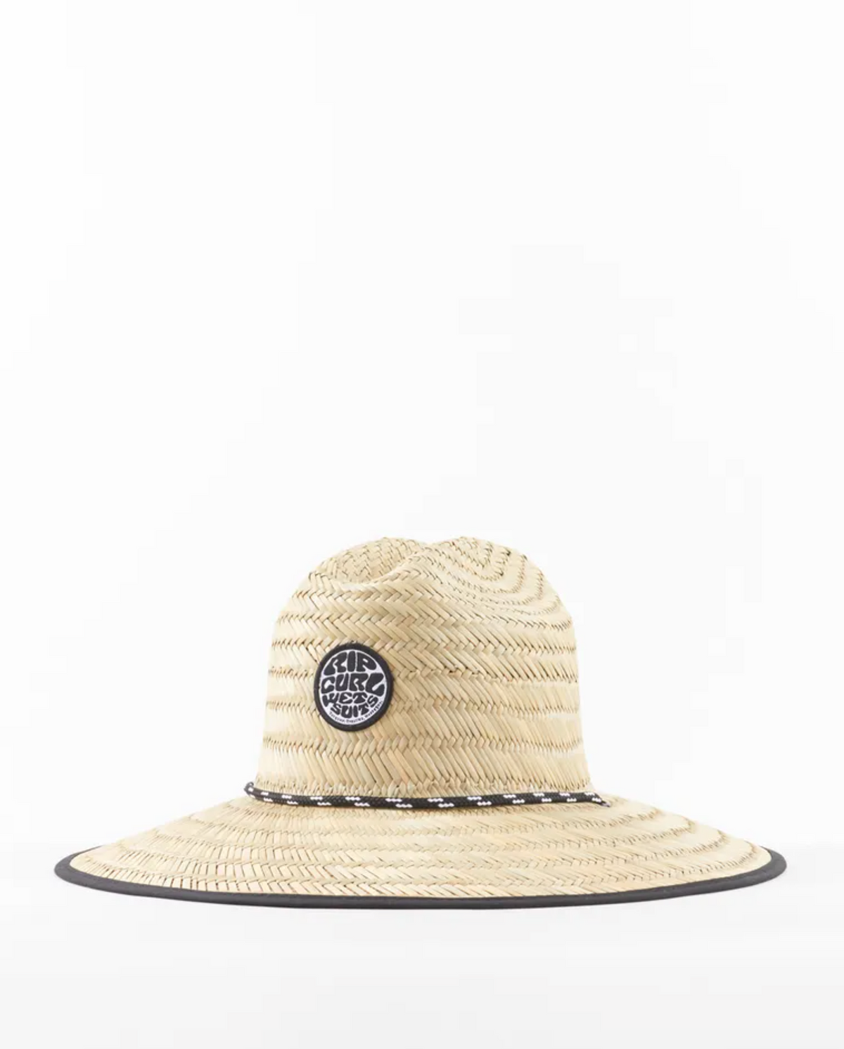 The Rip Curl Icons Straw Hat boasts a wide brim with black trim and a slightly frayed look. A round black patch with white text decorates the front, adding allure. Its woven design showcases excellent craftsmanship on a pristine white background.
