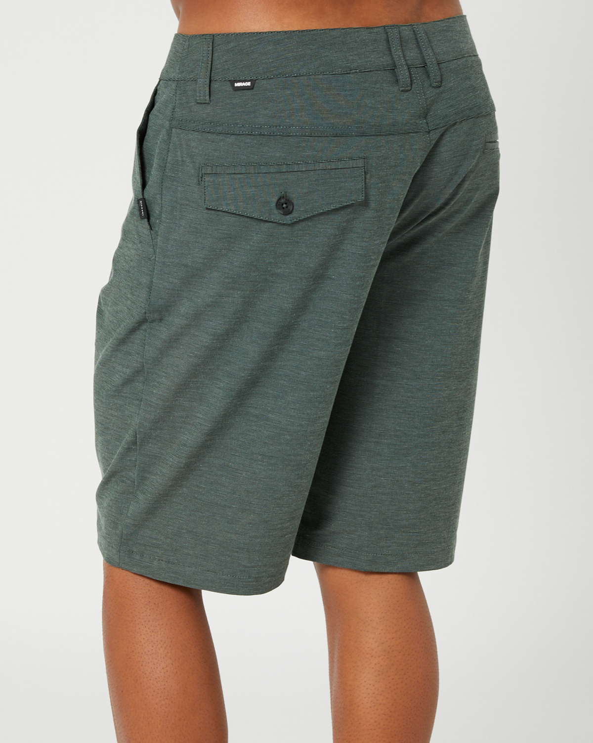 The Rip Curl Boardwalk Phase Short in dark green features a black buttoned back pocket. Made from quick-dry fabric, it includes belt loops and a subtle texture, emphasizing both practicality and style against a white background.