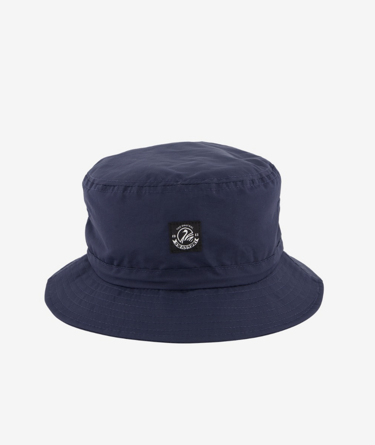 Introducing the Swanndri Murrays Bay v2 Hat: a navy blue bucket hat with a small black patch featuring white text and design, offering a wide, downward-sloping brim and DWR coating for water resistance while keeping its simple, solid color style.
