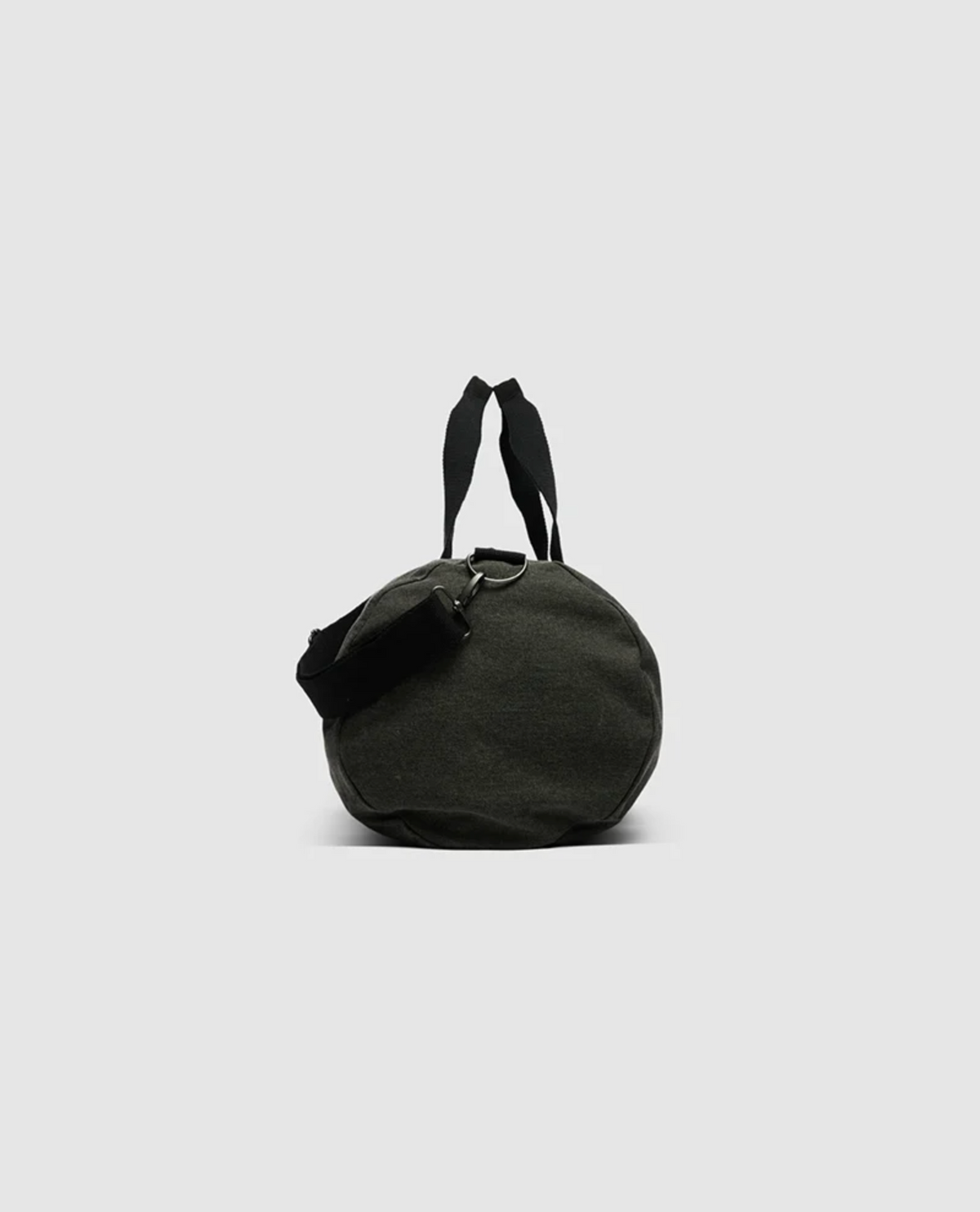 The Rodd & Gunn Double Barrel Duffle Bag is cylindrical, black, and crafted from durable cotton canvas. It features attached straps and a small side pouch, photographed upright on a plain gray background to emphasize its shape and texture.