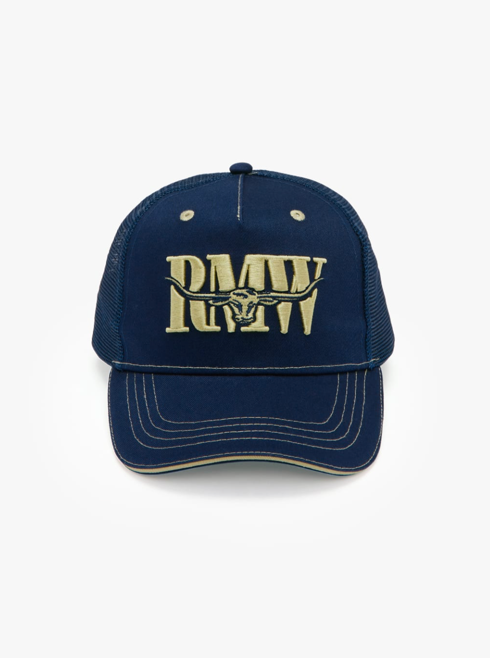 The RM Williams Cremorne Cap is a navy blue trucker cap with gold embroidery on the front, showcasing the R.M.Williams logo along with a longhorn icon in the center. It features a mesh back and an adjustable strap for a comfortable fit.
