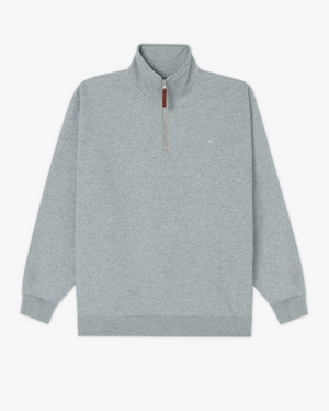 The RM Williams Mulyungarie Fleece in Grey Marle is a light grey quarter-zip jumper with a high collar, ribbed cuffs and hem, subtle brown zipper pull tab, and a minimalist long-sleeve design without bold logos or patterns.