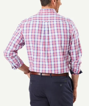 A man wearing a comfortable, regular fit Gazman Casual Oxford Check Shirt and dark trousers is shown from the back. His left hand is on his hip, and he is wearing a brown belt. The 100% cotton shirt features a mix of red, blue, and white plaid colors.