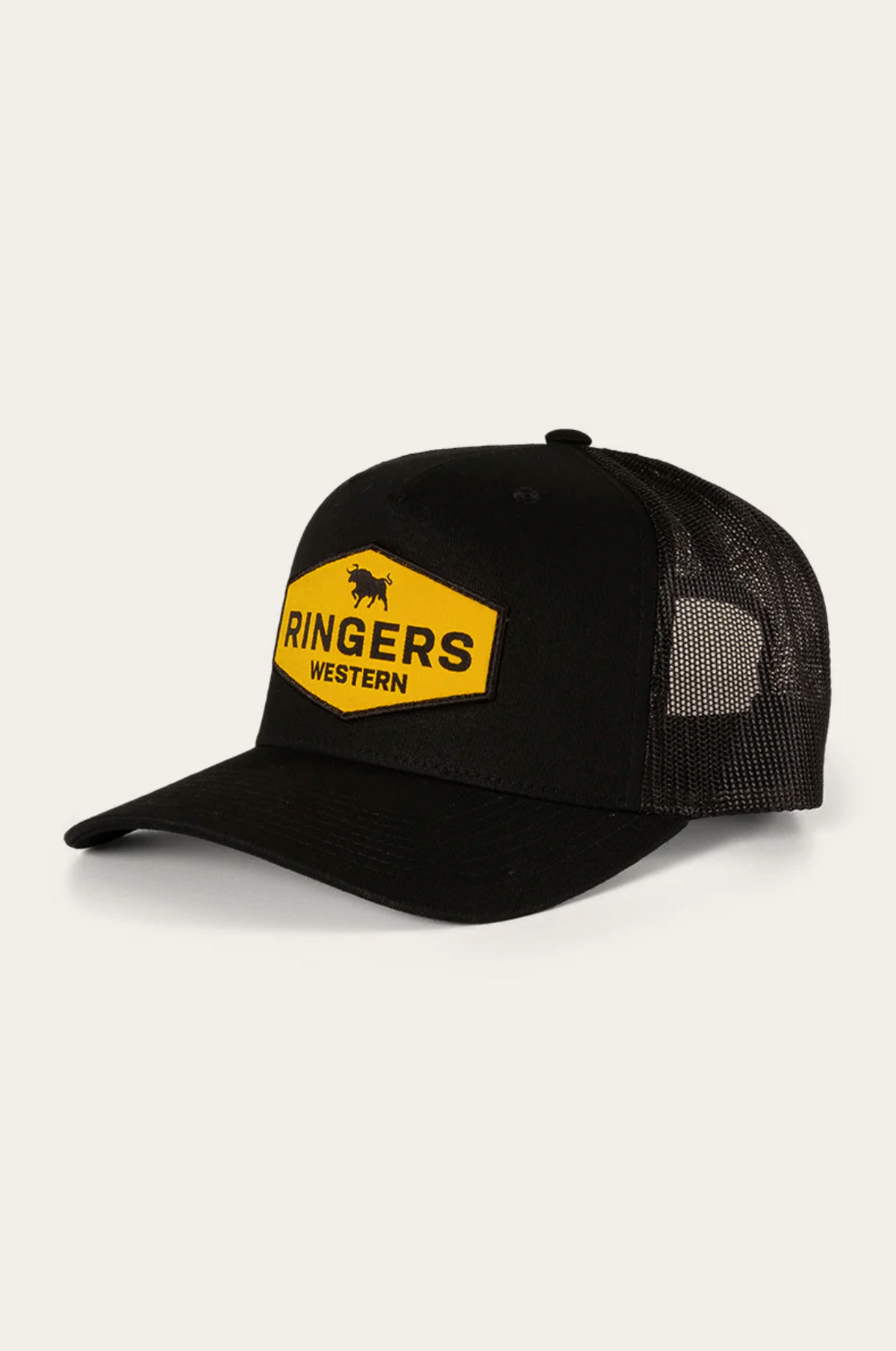 The Ringers Western Scotty Trucker Cap boasts a black cotton twill front with a standout yellow "Ringers Western" patch in bold black letters. Its mesh back ensures breathability, and the curved brim adds a classic touch to this versatile cap.