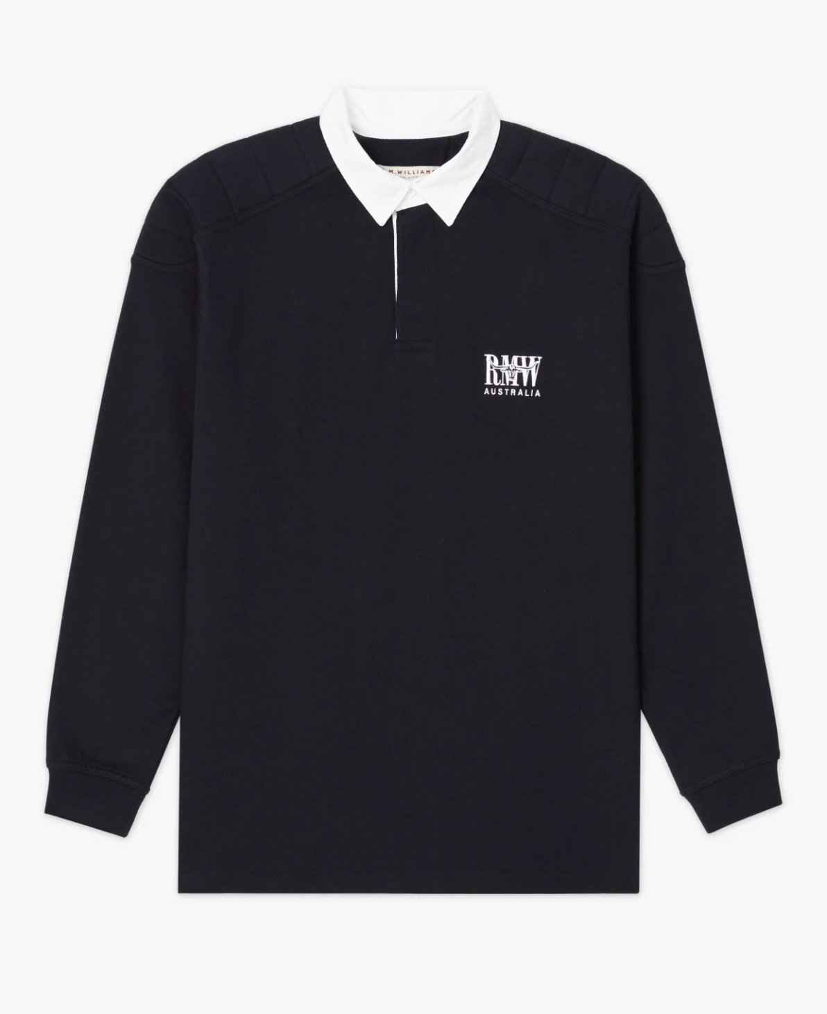 The RM Williams Classic RMW Rugby features a long-sleeve black rugby shirt with a white collar, crafted from soft cotton jersey. White text on the left chest reads "R.M.W. Australia," in the signature heritage logo embroidery, giving this shirt a timeless and minimalist design.