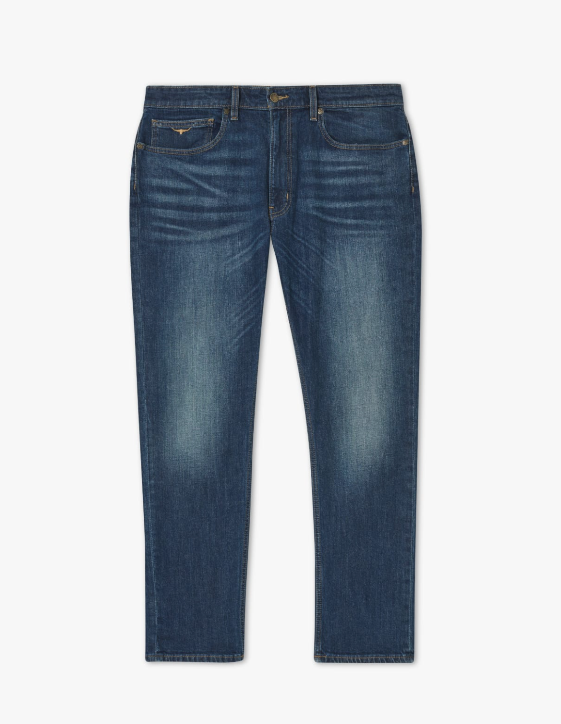 The RM Williams Ramco Jean is a pair of blue stretch denim jeans with a slight fade on the thighs. These premium cotton jeans feature a classic five-pocket design, belt loops, and a front button and zipper closure. The fabric appears slightly worn in, giving them a casual, distressed look.