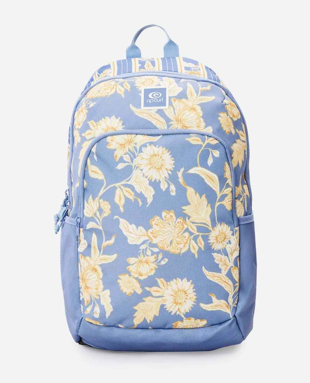 The Rip Curl Ozone 2.0 30L Backpack is made from recycled polyester and features a blue design, large front pocket, adjustable straps, and a yellow floral pattern with various flowers and leaves. The stylish look is completed with a small logo patch on a striped background.