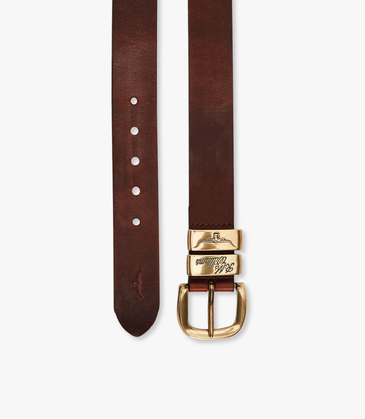 The RM Williams Drover Belt, crafted from vegetable-tanned leather in a rich brown hue, boasts multiple adjustment holes. It is adorned with an antique brass buckle featuring an engraved design and logo, lending an air of sophistication. The belt's pointed end is accentuated with a subtle embossed logo for added detail.