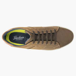 Top view of the Florsheim Crossover Lace Sneaker shows a brown leather upper and dark brown laces. It includes a white slip-resistant rubber sole, an interior label stating "Florsheim Shoe Company," green fabric lining, and a blue insole.