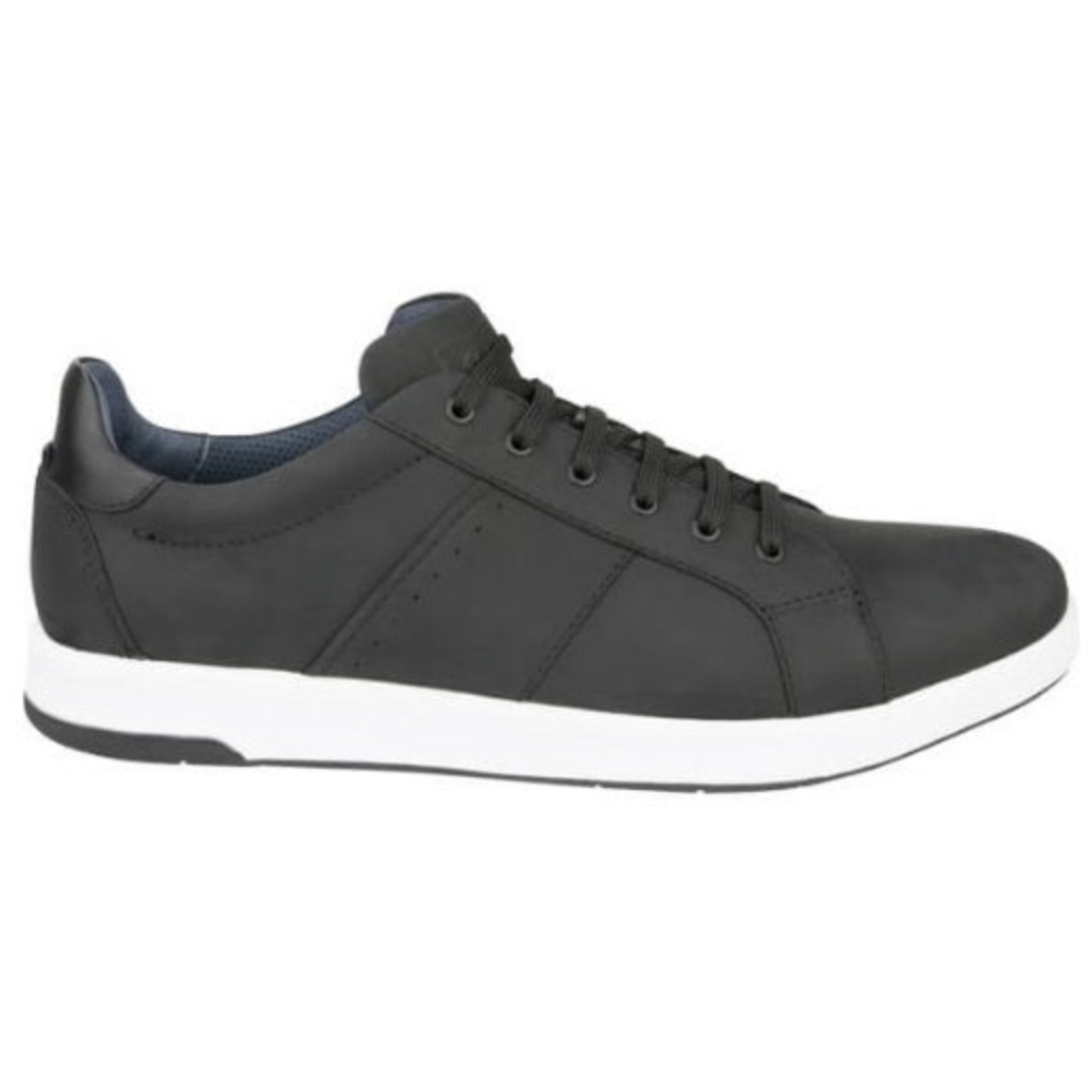 The Florsheim Crossover Lace Sneaker is a black leather low-top with a white sole, lace-up closure featuring black laces, and subtle stitching. It includes a dark gray inner lining and cushioned footbed for comfort.