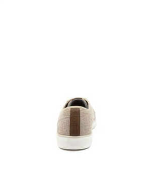 Rear view of the Colorado Albatross Canvas Sneaker in beige, featuring a wide fit, white sole, and a brown stripe on the heel. A memory foam inner sole enhances comfort. The background is plain white.
