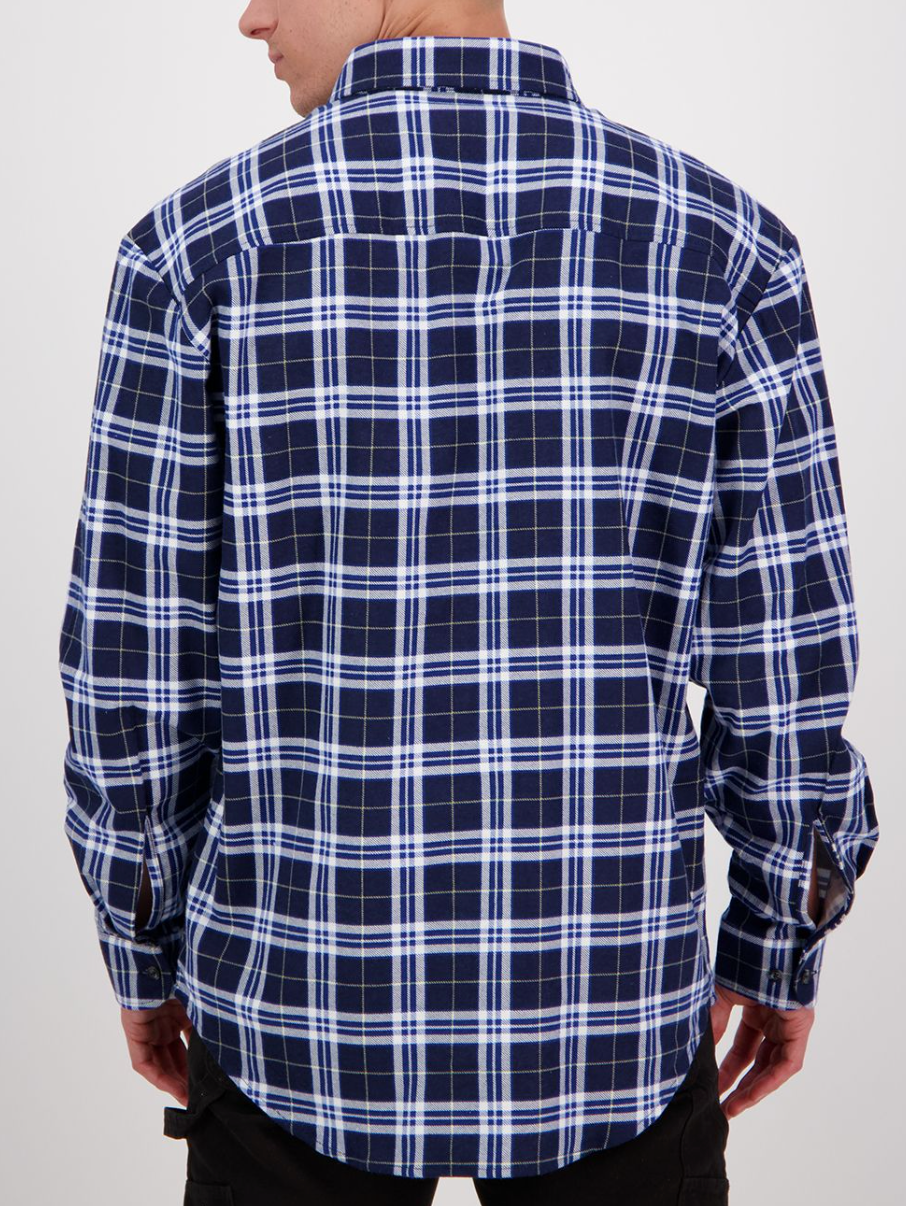 Rear view of a person in a Swanndri Egmont Flannelette Shirt, featuring a blue and white checkered pattern on brushed cotton. The classic plaid design contrasts with the plain white background as the person's hands rest at their sides.