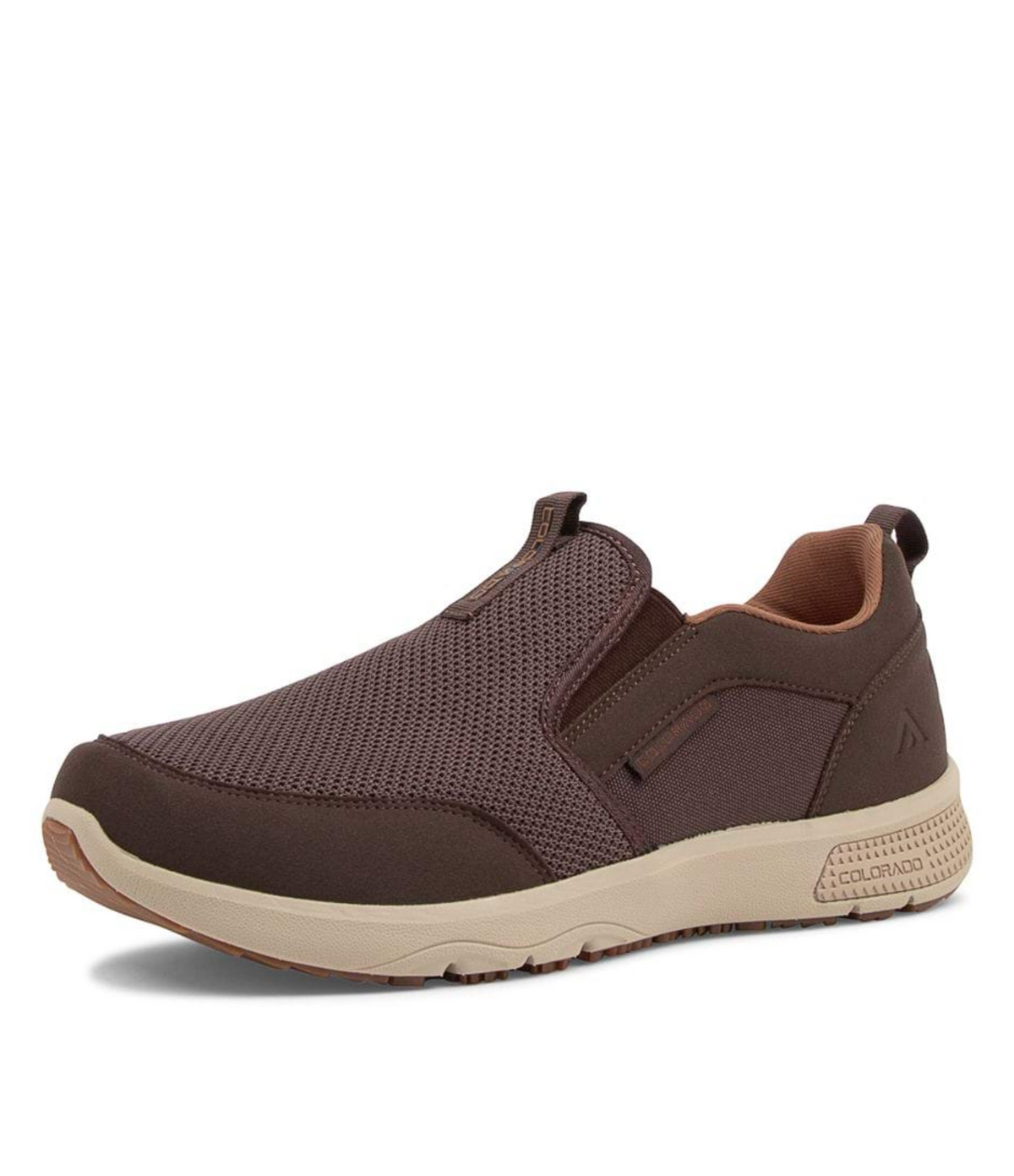 The Colorado Saka Casual Shoe is a brown slip-on with a mesh upper and suede accents, offers arch support, features a beige sole with text by the heel, has elastic side panels for easy on and off, and includes a pull tab at the heel.