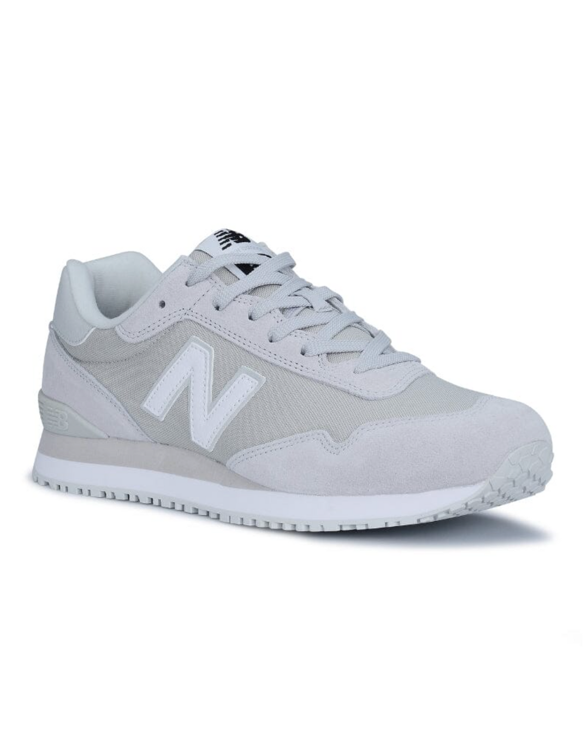 The New Balance 515 SR Shoe is a grey athletic shoe with a white sole and laces, featuring a large "N" logo. It boasts a sleek design with suede and mesh materials, slip-resistant rubber outsole, slightly elevated heel, and lightweight EVA midsole for comfortable strides.