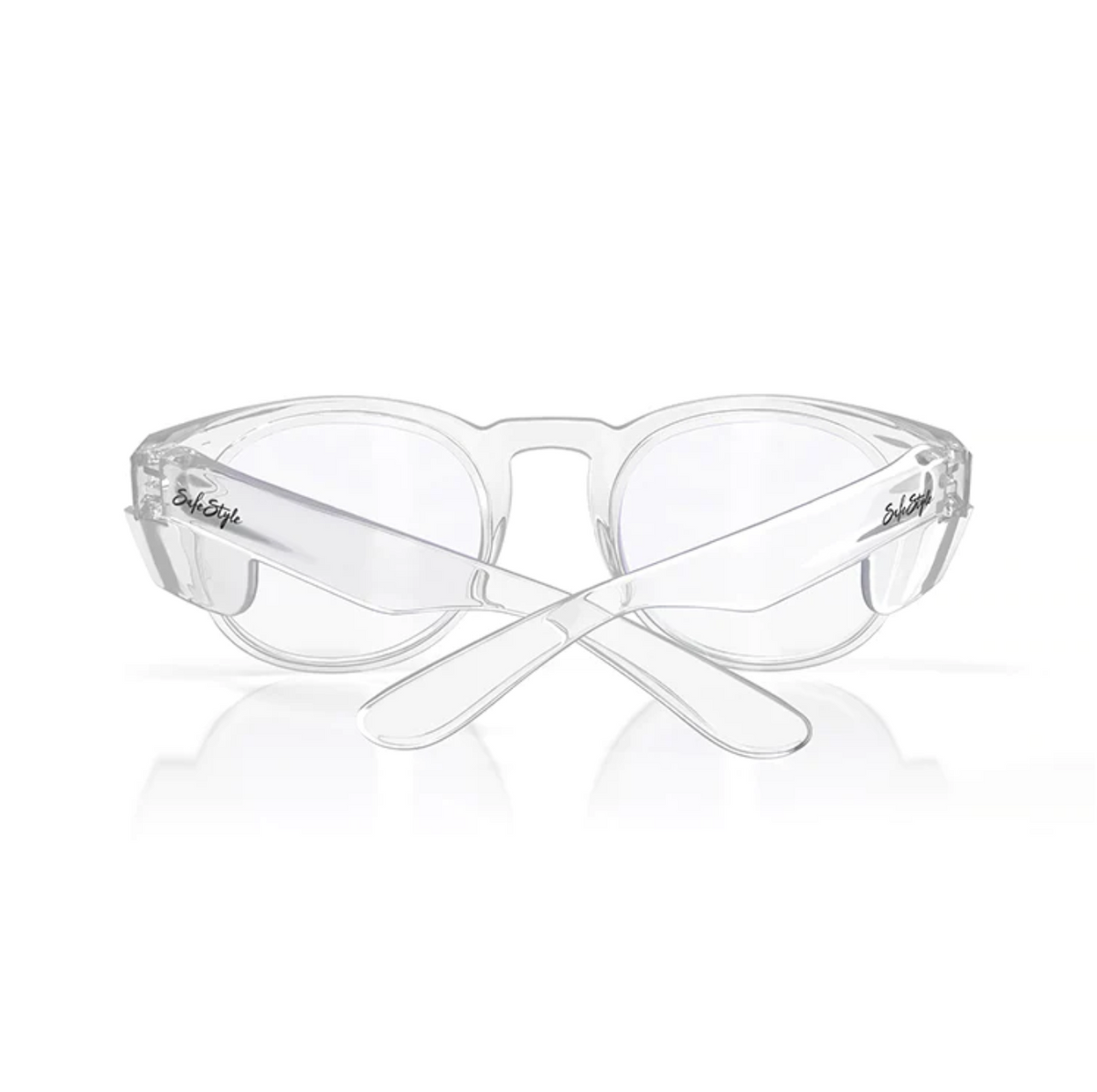 SafeStyle Cruisers Clear Frame Clear Lens glasses have a wraparound design and transparent lenses for UV protection, featuring branding on the temples. Viewed from the front with crossed arms, they meet essential safety ratings for peace of mind.