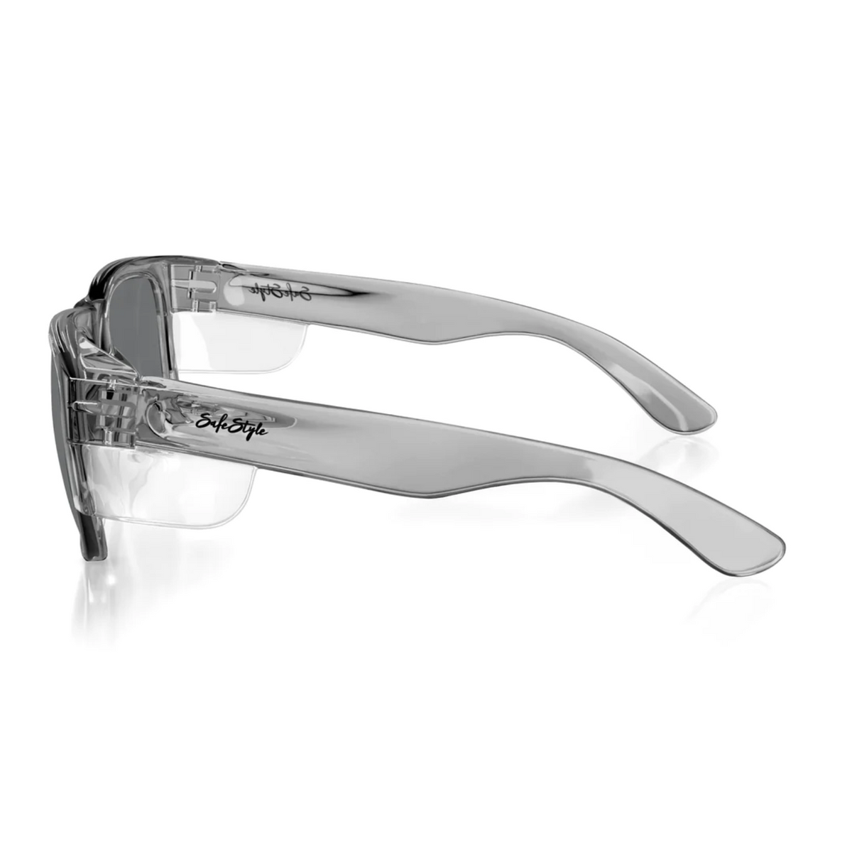 Side view of SafeStyle Fusions transparent safety glasses with tinted lenses and a sturdy graphite frame featuring wide temples. These protective eyewear glasses include black detailing and prominent branding on the temple arms, which curve gently for a secure fit.