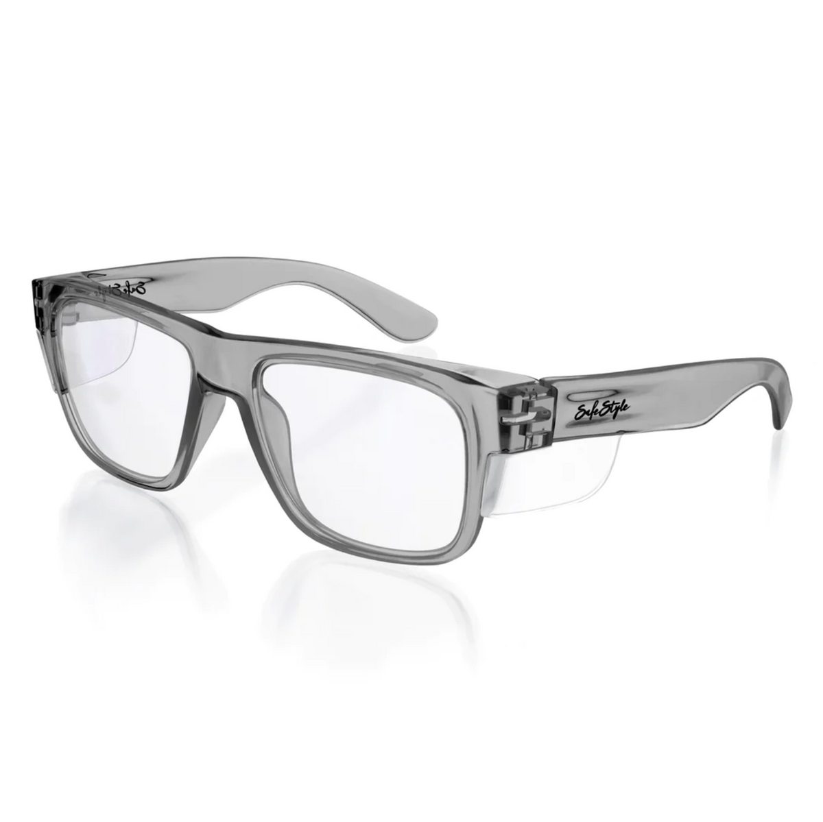 The SafeStyle Fusions Graphite Frame Clear Lens glasses feature thick, glossy, clear rectangular frames with durable polycarbonate lenses. The clear arms include a script logo, offering optimal comfort and UV protection in a stylish design.