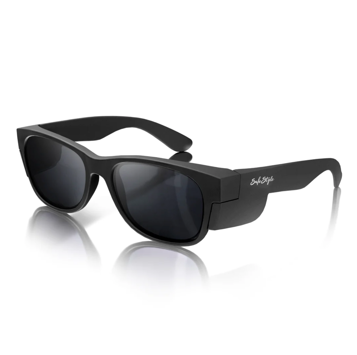 The SafeStyle Classics feature a black, rectangular matte frame, thick temple arms with UV protection, and dark polarized lenses that reflect light. The design includes a white logo on the right arm.